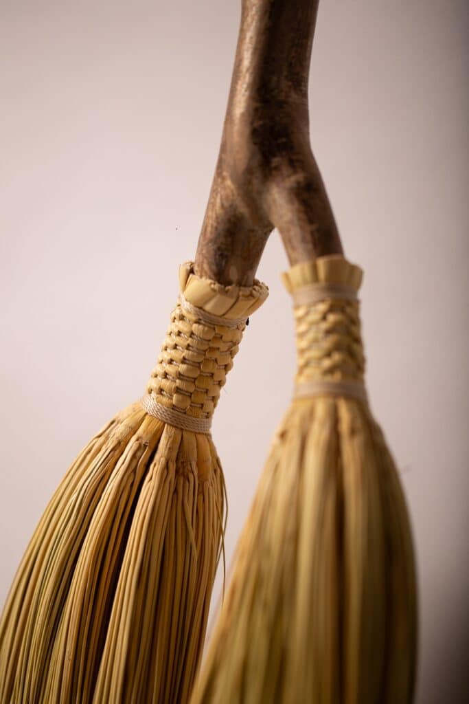 Double headed Shaker broom English hazel handle close up
